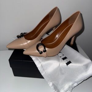 Unworn Coach Elegant Tan Pumps with Black Accent